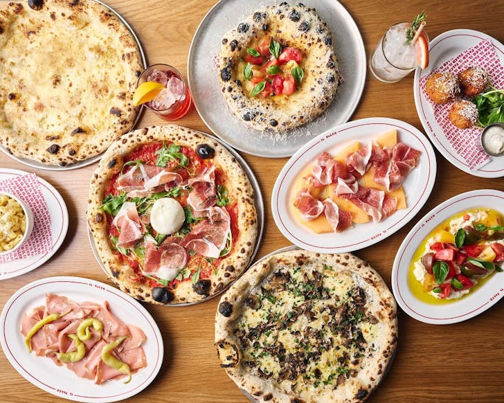 A table full of food at Il Falco pizza in Mount Hawthorn
