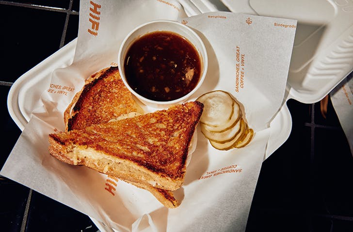 A golden, crunchy toastie with a cup of coffeeâone of the best breakfasts in Melbourne